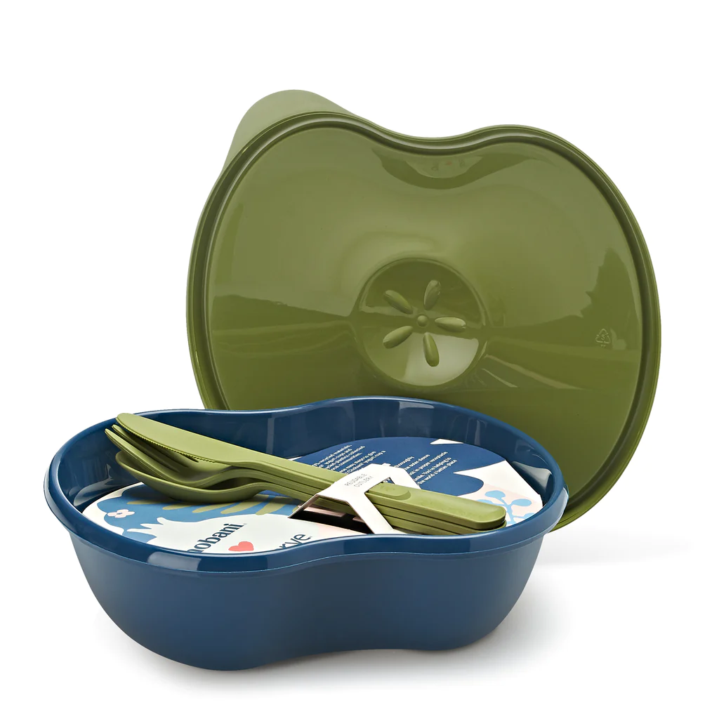 Image of a limited edition lunch kit made from 100% recycled #5 plastic in partnership with Chobani. Features a Preserve Sandwich Food Storage container and a snap-together reusable cutlery set. Includes a 25 oz. capacity food storage container with snap-on lid and a set of reusable snap-together cutlery. Ideal for sandwiches, leftovers, salads, and more. Complies with U.S. standards for BPA.