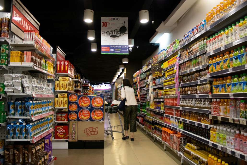 Grocery aisle where you can see CPG food packaging on each side