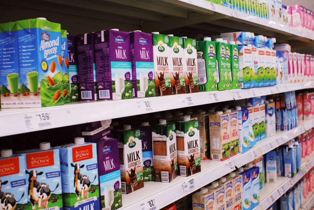 CPG Marketing Terminology - Shelves with Various Milk Boxes